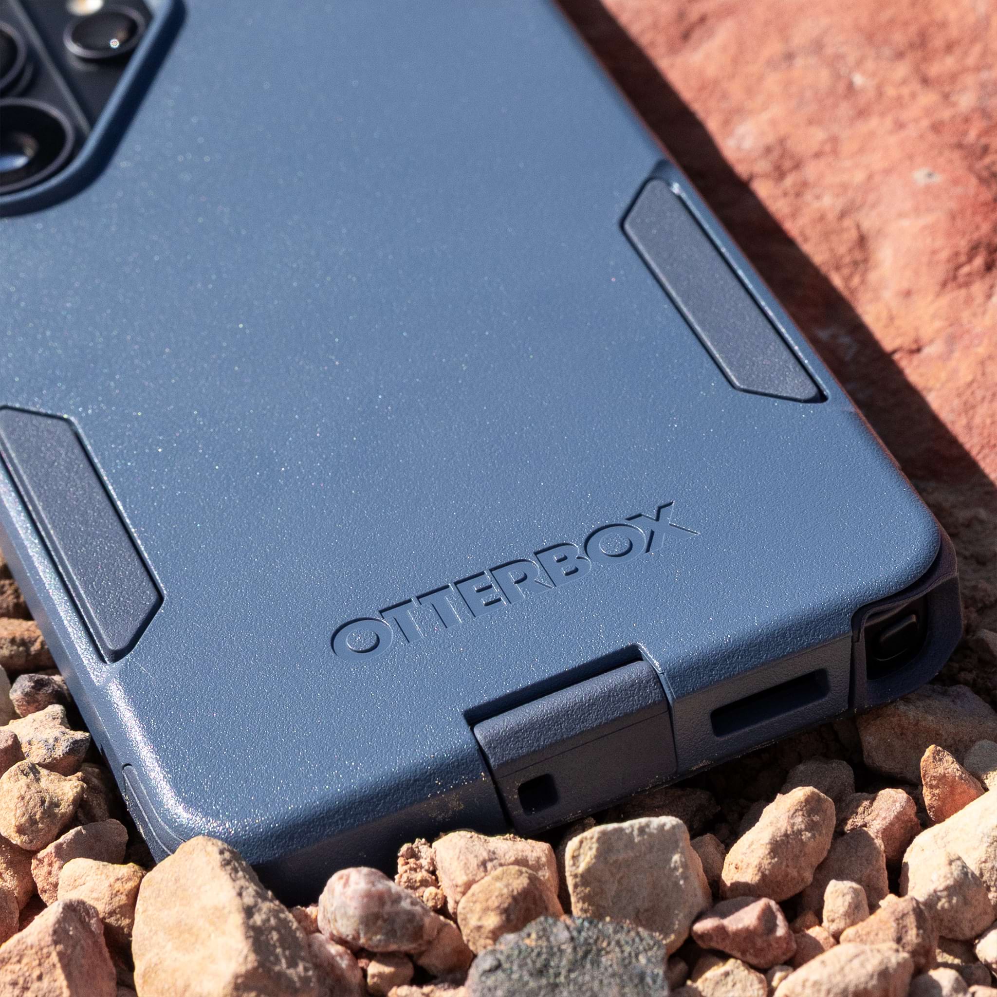 Blue OtterBox phone case for Samsung Galaxy on rocky background