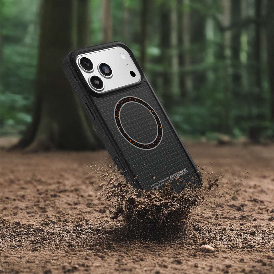 Phone case with grid pattern and brand logo on a forest floor background