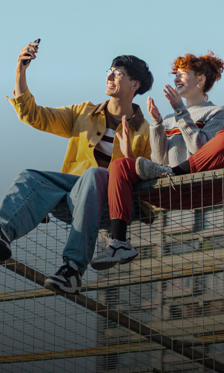 couple taking a selfie with phone