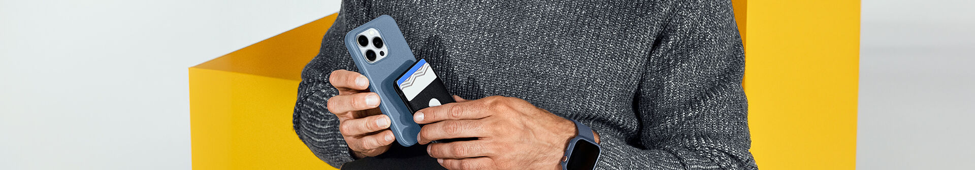 MagSafe wallet attaching to blue iPhone case