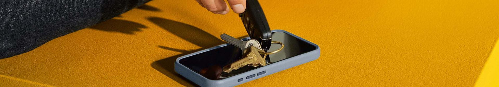 keys dropping on phone screen protector