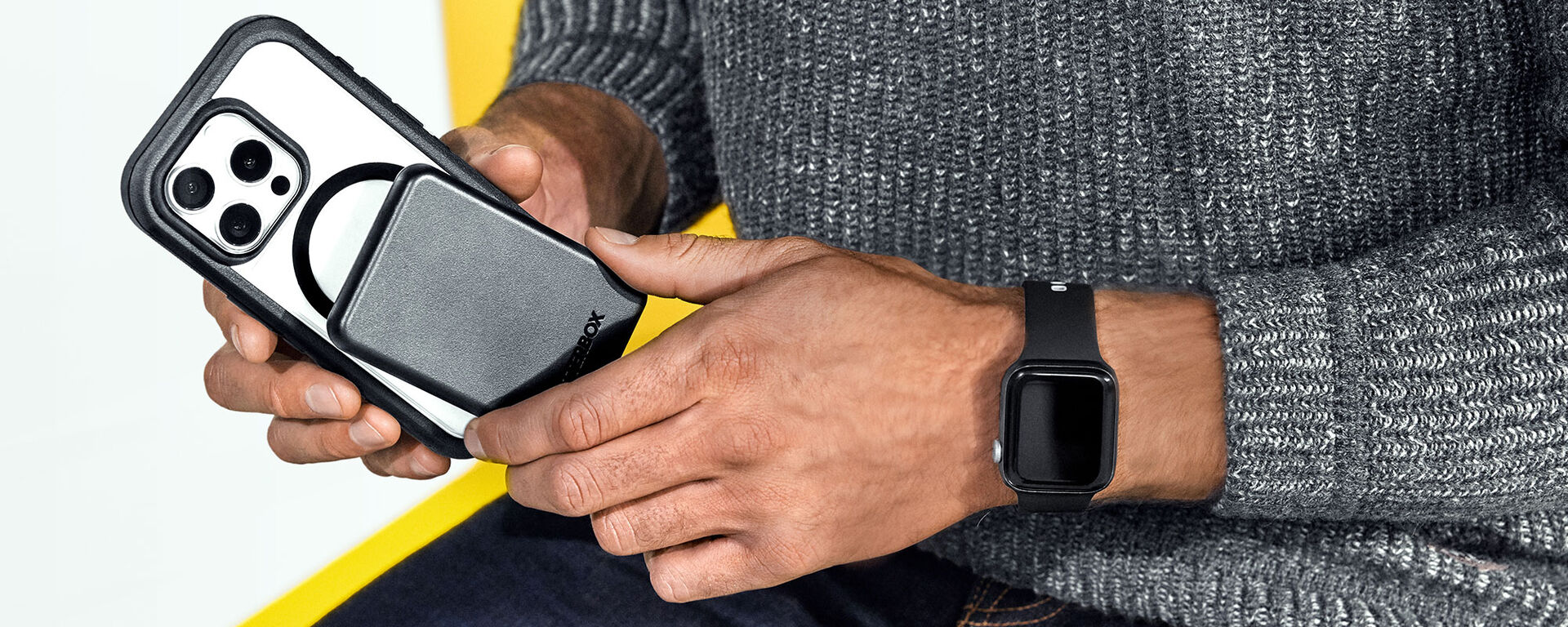 MagSafe power bank charging iPhone protected by clear Defender Series XT case