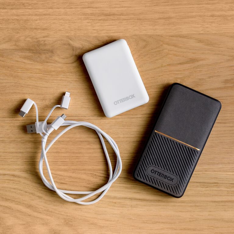 black and white power banks and charging cable